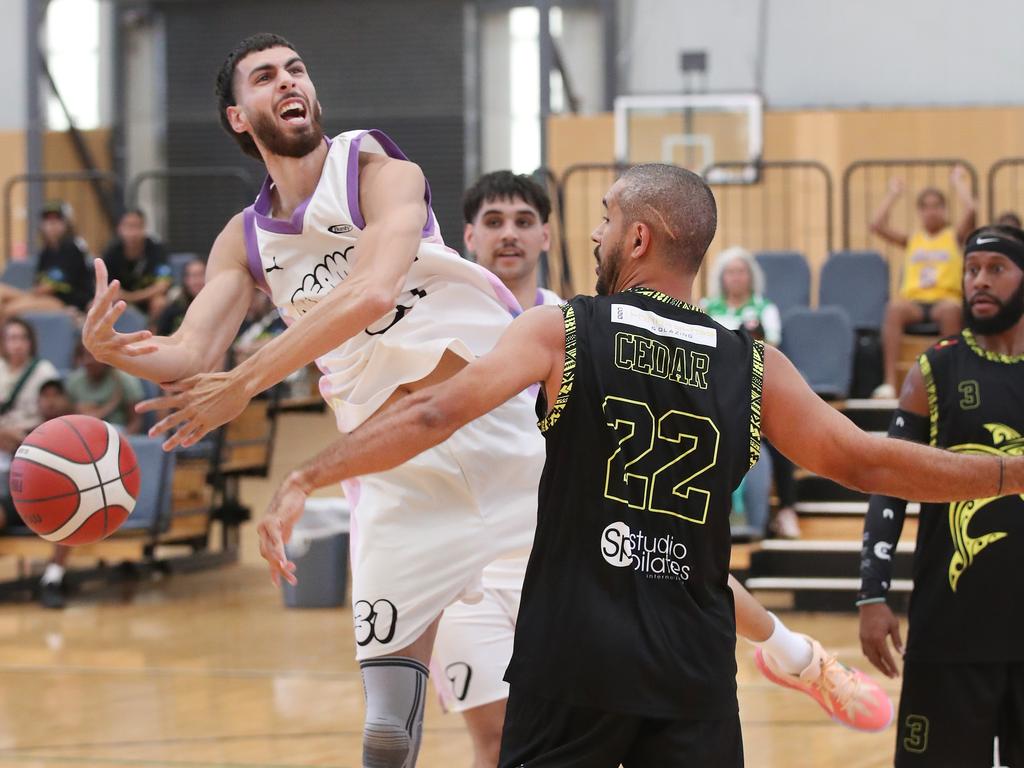 Basketball Queensland First Nations Championships at Coomera. Dreamers (white) v Erub Utd. Picture Glenn Hampson