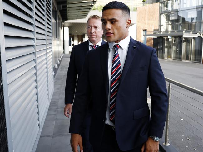 Spencer Leniu arriving at the NRL Judiciary alongside Trent Robinson on Monday evening. Picture: Jonathan Ng