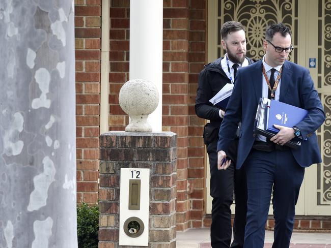 Police door knock residents in the area around Tenterfield Drive after Mr Filippi’s murder. Picture: Andrew Henshaw