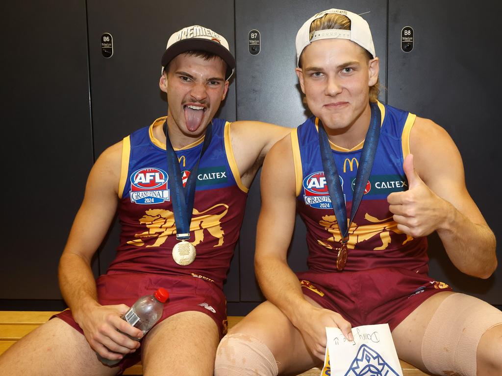 Wilmot and Will Ashcroft in premiership celebration mode.