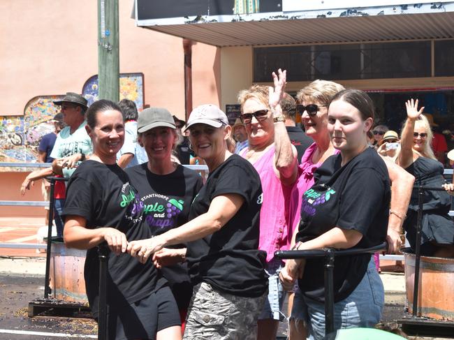 All smiles at the Apple and Grape Festival grape crush, March 1, 2024