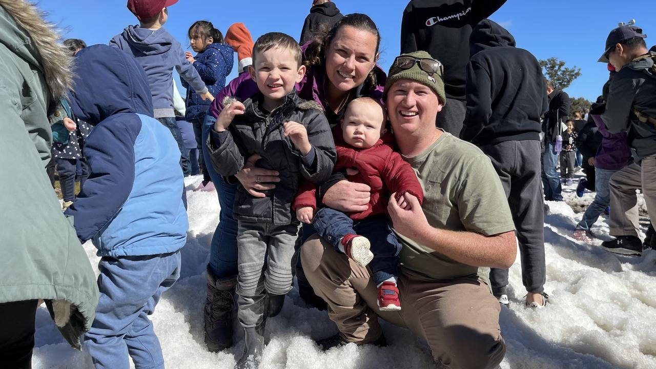 Ipswich family Courtney, Ethan (5), Micah (1) and Josh Brown enjoy the snow at Snowflakes in Stanthorpe 2021. Photo: Madison Mifsud-Ure / Stanthorpe Border Post