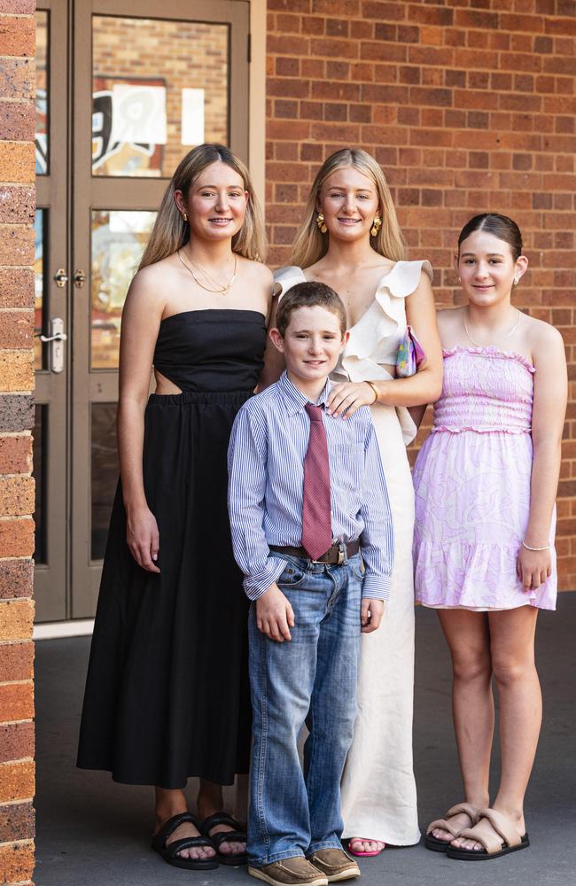 Graduate Ellie Hoch with siblings Laura (left), James and Abbie Hoch as Downlands College year 12 students come together for their valedictory mass at the college, Saturday, November 16, 2024. Picture: Kevin Farmer