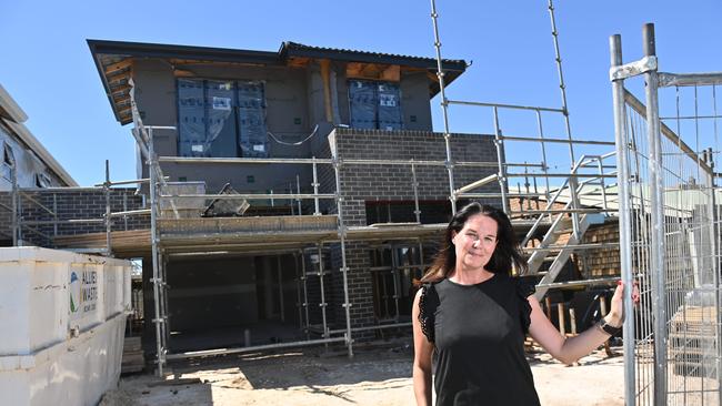 Yvette Growden is building a new house at West Lakes Shores with Metricon. She is part of a housing boom fuelling the state economy. Picture: Keryn Stevens