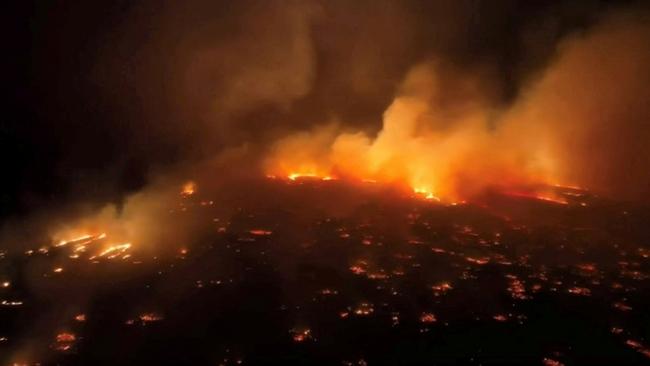 An aerial view of a wildfire in Kihei, Maui County, Hawaii, U.S., August 8, 2023 in this screen grab obtained from a social media video.   Clint Hansen of Maui Real Estate Radio/TMX via REUTERS  THIS IMAGE HAS BEEN SUPPLIED BY A THIRD PARTY. MANDATORY CREDIT. NO RESALES. NO ARCHIVES.