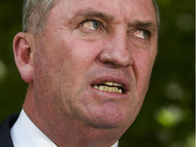 A composite image created on Tuesday, April 23, 2019, of  (left) Former Deputy Prime Minister Barnaby Joyce speaks to the media during a press conference at Parliament House in Canberra, Monday, February 18,  2019. (AAP Image/Lukas Coch) NO ARCHIVING *** (right) Prime Minister Scott Morrison and Minister for Energy Angus Taylor at a press conference at an ice cream parlour, 40km south of Devonport in Tasmania, Tuesday, April 17, 2019. (AAP Image/Mick Tsikas) NO ARCHIVING