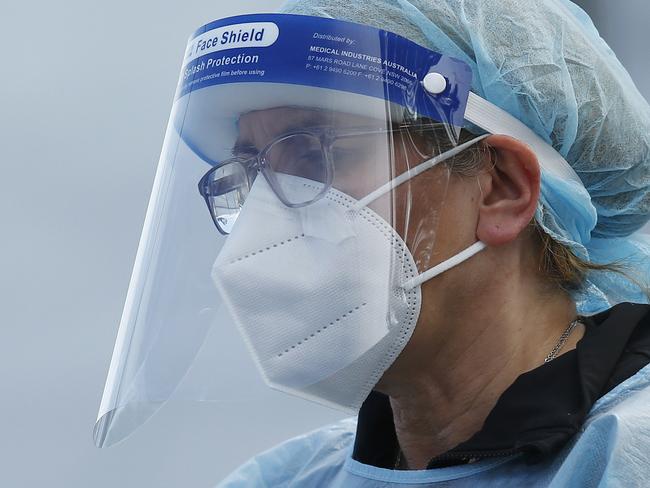 MELBOURNE, AUSTRALIA - NewsWire Photos SEPTEMBER 18, 2020:   Health workers are seen in full PPE at a pop-up COVID19 test site in Clyde, Melbourne, Victoria. Picture: NCA NewsWire / Daniel Pockett