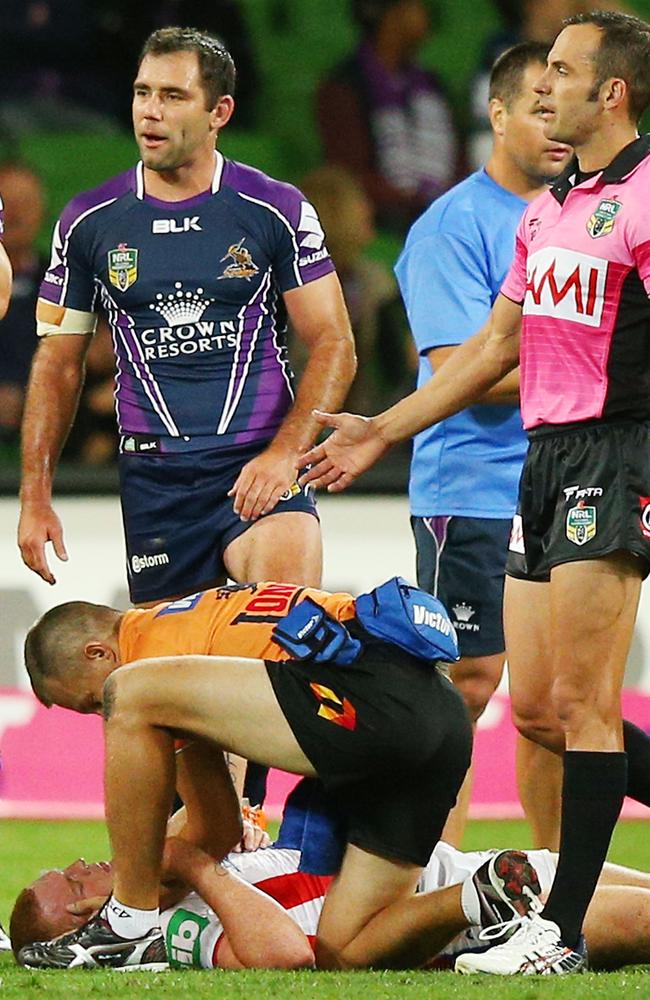 Alex McKinnon lays on the ground after being tackled. (Photo by Michael Dodge/Getty Images)