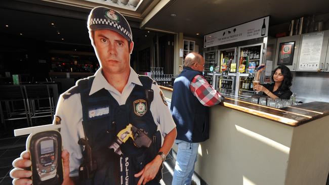 Police cardboard cut-outs to act as reminders inside hotels.