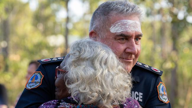 NT Police Commissioner Michael Murphy embracing Djalinda Ulamari, a senior Yolngu woman. Picture: Nina Franova / YYF