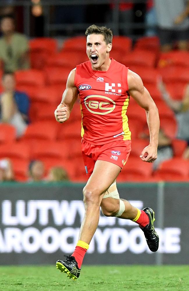 David Swallow celebrates after kicking what would be the match-sealer. Picture: AFL Photos/Getty Images