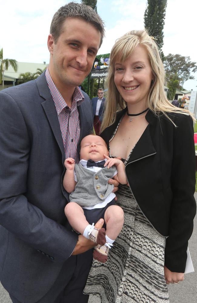 The most relaxed little man at the track — six-week-old Cooper Power and proud mum and dad Jay and Lynne Power. Picture: Mike Batterham