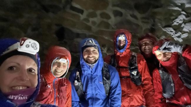 Jess Robbins on left with friends who walked up kunanyi/Mount Wellington in the dark in the snow. Picture: Jess Robbins