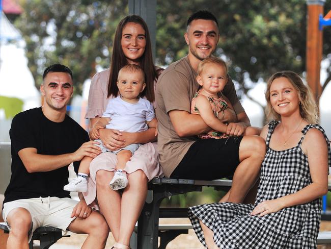 L-R Andrew Moloney, Chelsea Moloney and son Lee; Jason Moloney, Jorja Woodward and daughter Isla. Picture: Scott Powick