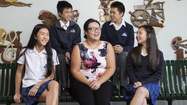 Canley Vale High School literacy teacher Rhianna Lima with Year 10 students Rebecca Huynh, 15, Robert Bui, 16, Sean Huynh, 14, and Sally Tran, 14. Picture: Hollie Adams