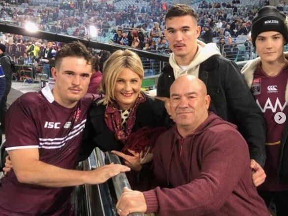 Jason Hetherington with his wife Kym and sons Kobe (QLD under-20s player), Zac (dark jacket) and Eli (beanie).