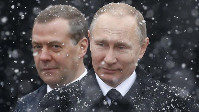 Dmitry Medvedev, left, said Moscow would respond ‘with everything we have’ if Vladimir Putin was arrested. Picture: EPA/The Times