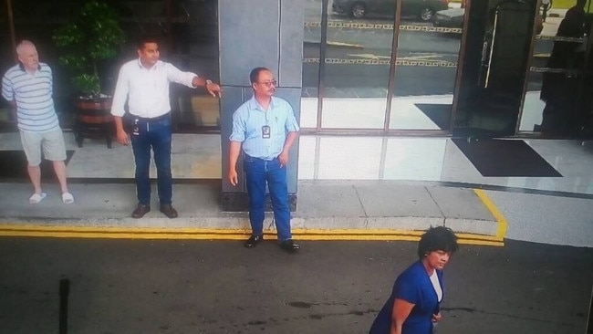 Security camera footage of Annapuranee Jenkins outside Hotel Jen in Penang, Malaysia, about 2.45pm on December 13, 2017. Her husband Frank Jenkins, far left, watches on.