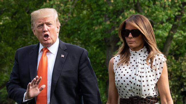 US President Donald Trump and First Lady Melania Trump arrive at the White House in Washington, DC, on April 24, 2019 after flying back from Atlanta, Georgia, where they delivered remarks at the Rx Drug Abuse and Heroin Summit. (Photo by NICHOLAS KAMM / AFP)