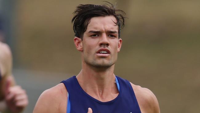 MELBOURNE , AUSTRALIA. November 24, 2023. AFL Australian Rules preseason training.   Jy Simpkin and Luke Davies-Uniacke of the Kangaroos  during North Melbourne training today  . Pic: Michael Klein