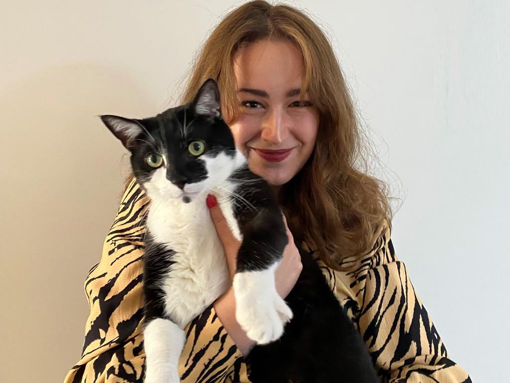 The Broke Generation's Emma Edwards with her cat Paddington. Picture: Supplied