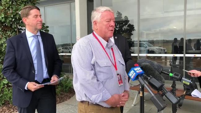 Cameron Dick, John Wagner and Paul Antonio at Wellcamp Airport talking about Qantas