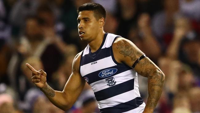 MELBOURNE, AUSTRALIA - JULY 06: Tim Kelly of the Cats celebrates after kicking a goal during the round 16 AFL match between the Western Bulldogs and the Geelong Cats at Marvel Stadium on July 06, 2019 in Melbourne, Australia. (Photo by Scott Barbour/Getty Images)