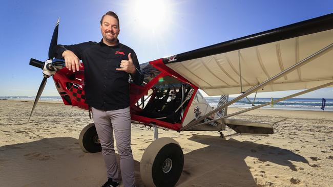 In a thrilling showcase set to mark the 90-day countdown to the 2024 Pacific Airshow Gold Coast, STOL Bushcat aircraft land on Surfers Paradise Beach. Airshow Director Kevin Elliott with one of the aircraft. Pics Adam Head