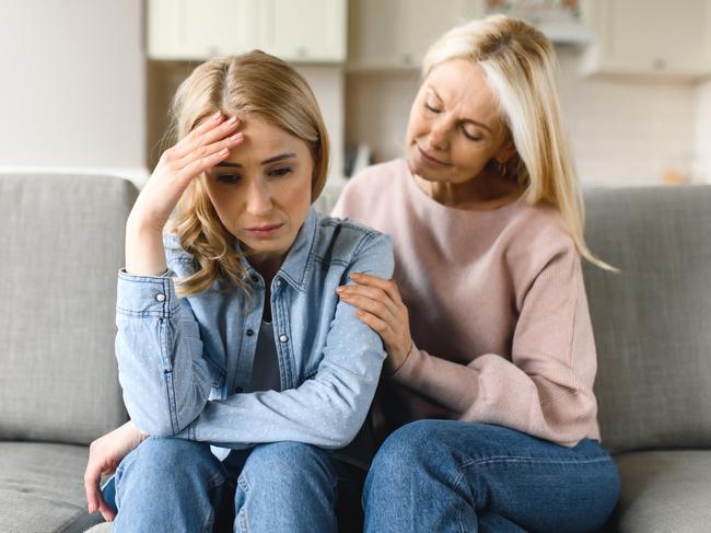 MENTAL HEALTH -  Worried mature mother consoles her adult daughter, helping with problem and depression, caring she, empathy, expressed maternal support. Support of a loved one Picture: Istock