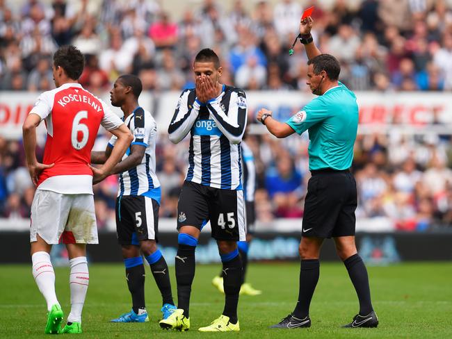 Aleksandar Mitrovic can’t hide his surprise after being sent off by referee Andre Marriner.