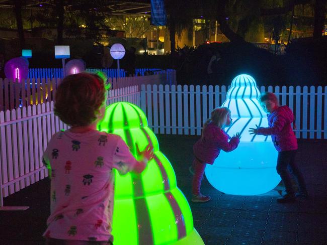 Children are encouraged to get up close to some of the displays. Picture: Steve Christo