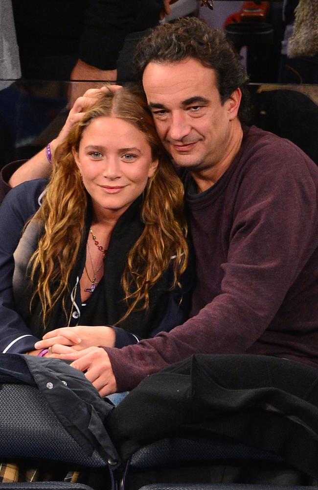 Mary-Kate Olsen and Olivier Sarkozy at a basketball game in 2012. Picture: James Devaney/WireImage