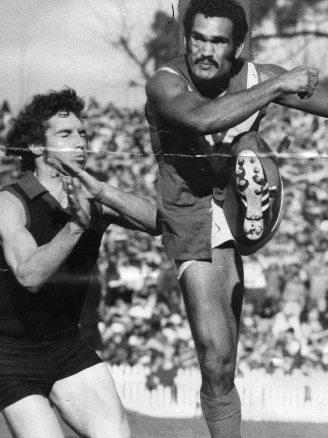 Sonny Morey with John Menz in the Central v Norwood match in 1972.