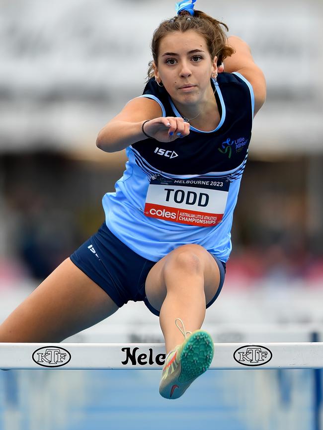 NSW’s Piper Todd clears the hurdle.