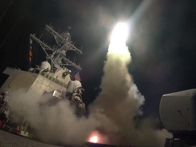 Mr Trump ordered 59 missiles to be blasted at the Syrian air base from which this week’s chemical weapons attack is thought to have been launched. Picture: Mass Communication Specialist 3rd Class Ford Williams/US Navy via AP