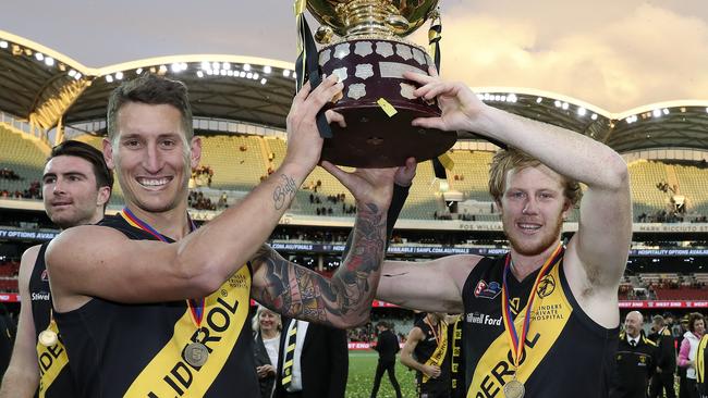 Glenelg’s Jesse White and Joshua Scott after winning the 2019 premiership. Picture: Sarah Reed