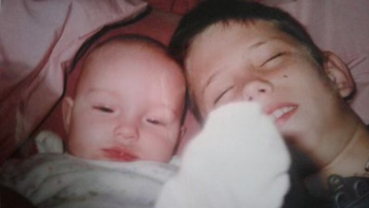 Mitchell Francis Callaghan with his baby sister Sarah.