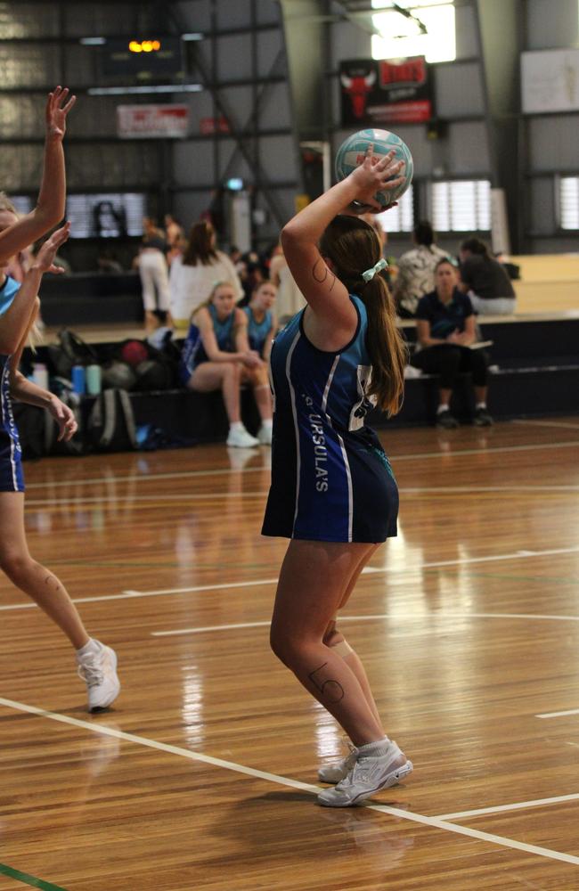 Netball action from QISSN 2024 in Townsville. St Ursula's College v Holy Spirit College
