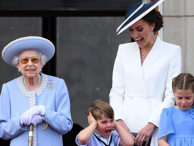 The Queen wore blue at Trooping the Colour – a hue also worn bt Prince Louis, centre, and Princess Charlotte. Kate Middleton included navy in her ensemble, via her headwear. Picture: AFP