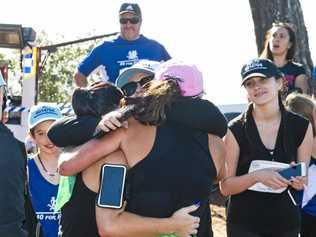 Susie Forte hugs  Katie Forte at the end of 40 for Fortey relay run. Sunday, 27th May, 2018. Picture: Nev Madsen