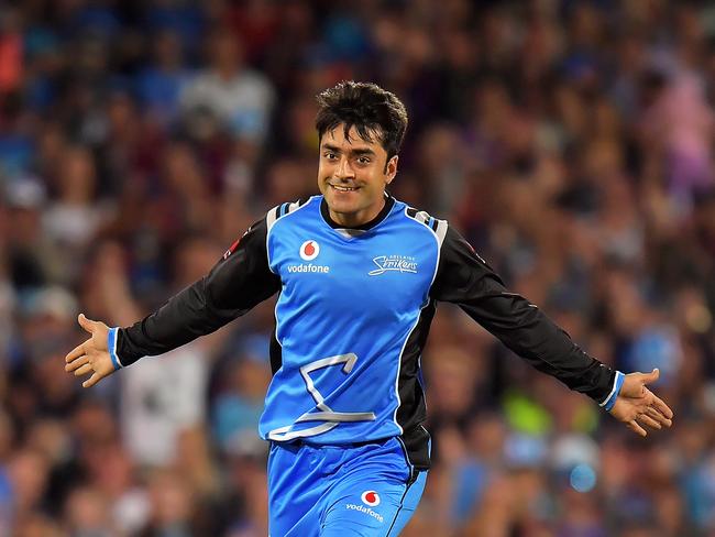 ADELAIDE, AUSTRALIA - DECEMBER 31:  Rashid Khan of the Adelaide Strikers celebrates after taking a wicket during the Big Bash League match between the Adelaide Strikers and the Brisbane Heat at Adelaide Oval on December 31, 2017 in Adelaide, Australia.  (Photo by Daniel Kalisz/Getty Images)