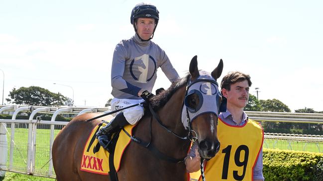 Ronnie Stewart rounds out a winning double at Doomben aboard Hell. Picture: Grant Peters - Trackside Photography