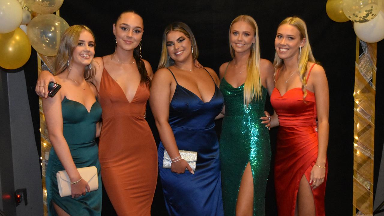 Tahlia Stevens, Zoe Sutton, Emma Macavoy with Ella and Sophie Drew at the 2022 Kawana Waters State College formal. Picture: Sam Turner