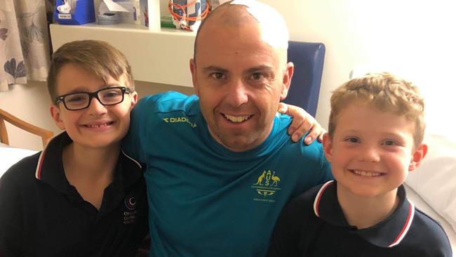 The track cycling coach with sons Cohen and Austen. Picture: Supplied