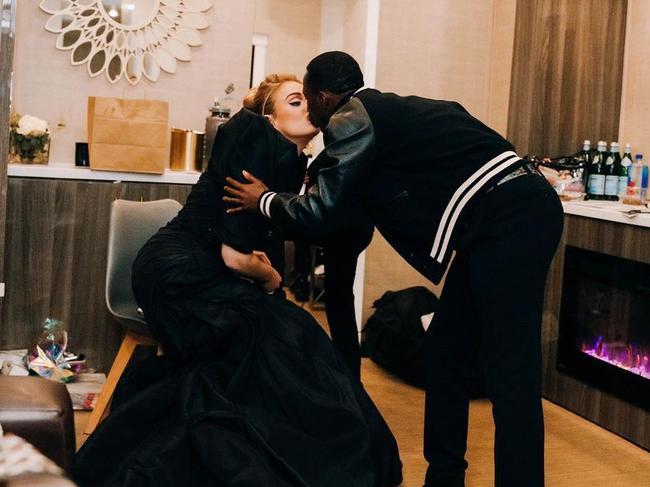 One photo showed them sharing a kiss at one of Adele’s shows.