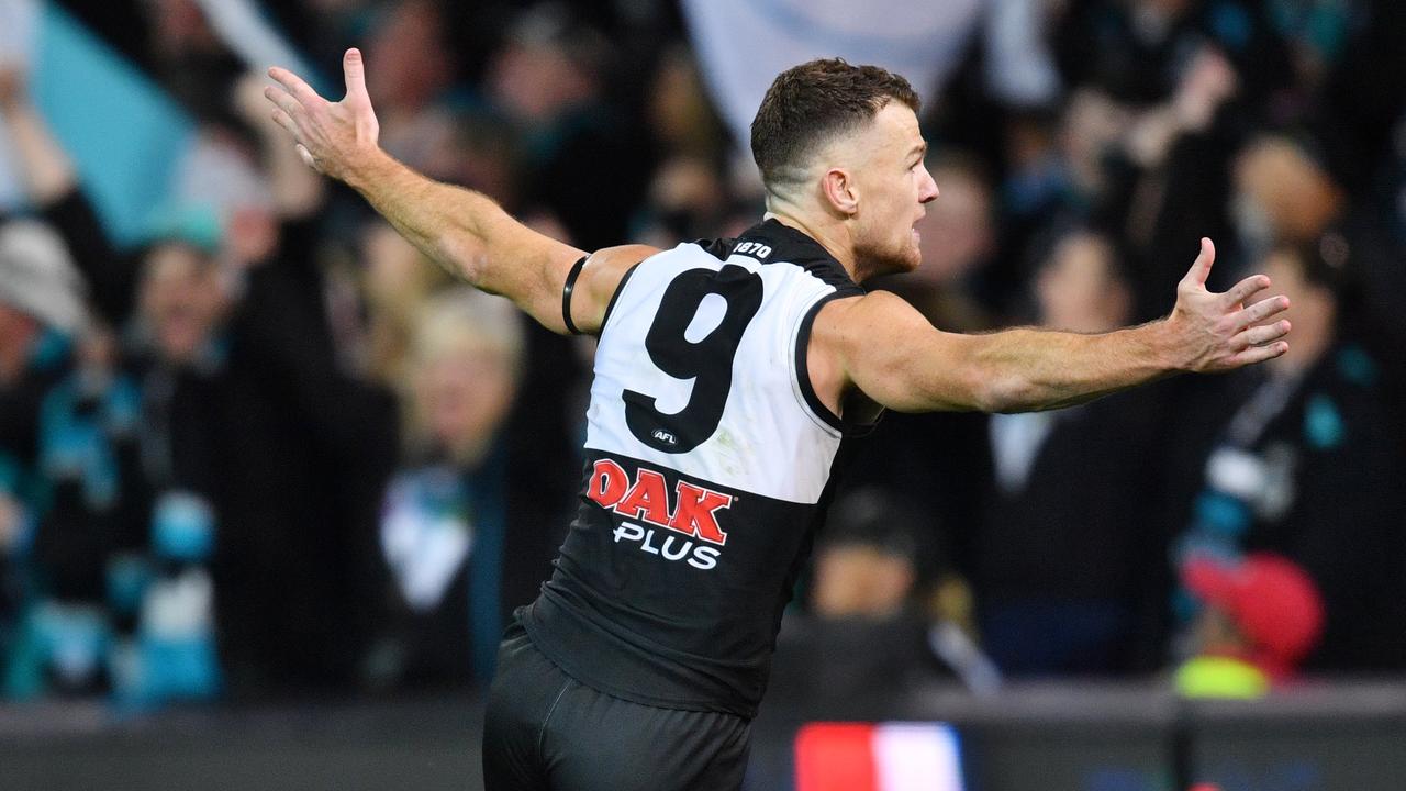 Robbie Gray celebrates a goal in his game turning third quarter on Saturday night.