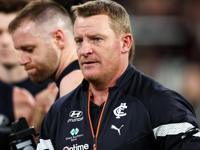 MELBOURNE, AUSTRALIA - JUNE 11: Michael Voss, Senior Coach of the Blues addresses his players during the 2023 AFL Round 13 match between the Carlton Blues and the Essendon Bombers at the Melbourne Cricket Ground on June 11, 2023 in Melbourne, Australia. (Photo by Dylan Burns/AFL Photos via Getty Images)