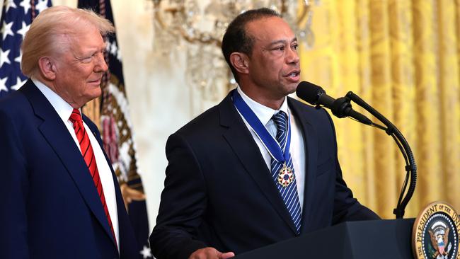 Tiger Woods speaks alongside U.S. President Donald Trump during a reception honoring Black History Month at the White House in February. (Photo by Win McNamee/Getty Images)