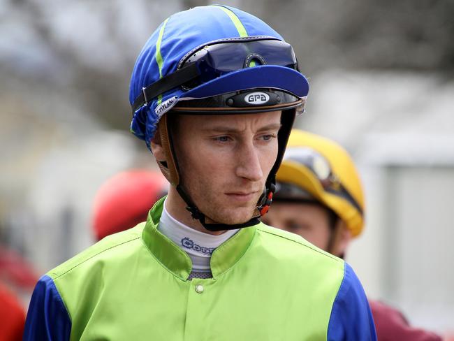 Jockey Luke Dittman will ramp up his return from a back injury today. (AAP Image/David Clark) 