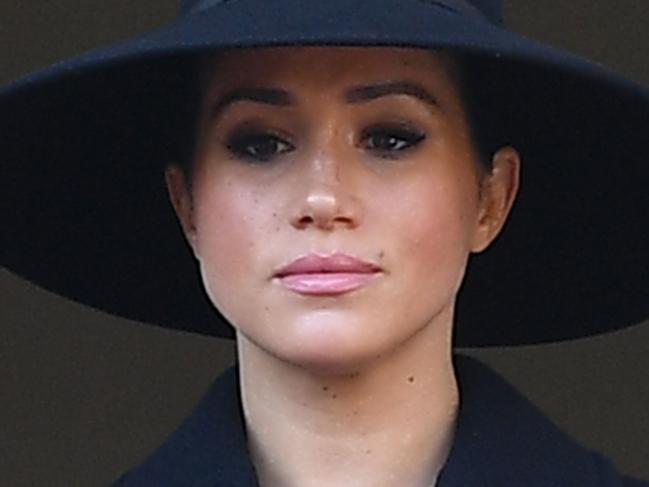 (FILES) In this file photo taken on November 10, 2019 Britain's Meghan, Duchess of Sussex looks on from a balcony as she attends the Remembrance Sunday ceremony at the Cenotaph on Whitehall in central London, on November 10, 2019. - Meghan Markle has revealed she suffered a miscarriage in July this year, writing in the New York Times on November 25, 2020 of the deep grief and loss she endured with her husband Prince Harry. (Photo by Daniel LEAL-OLIVAS / AFP)